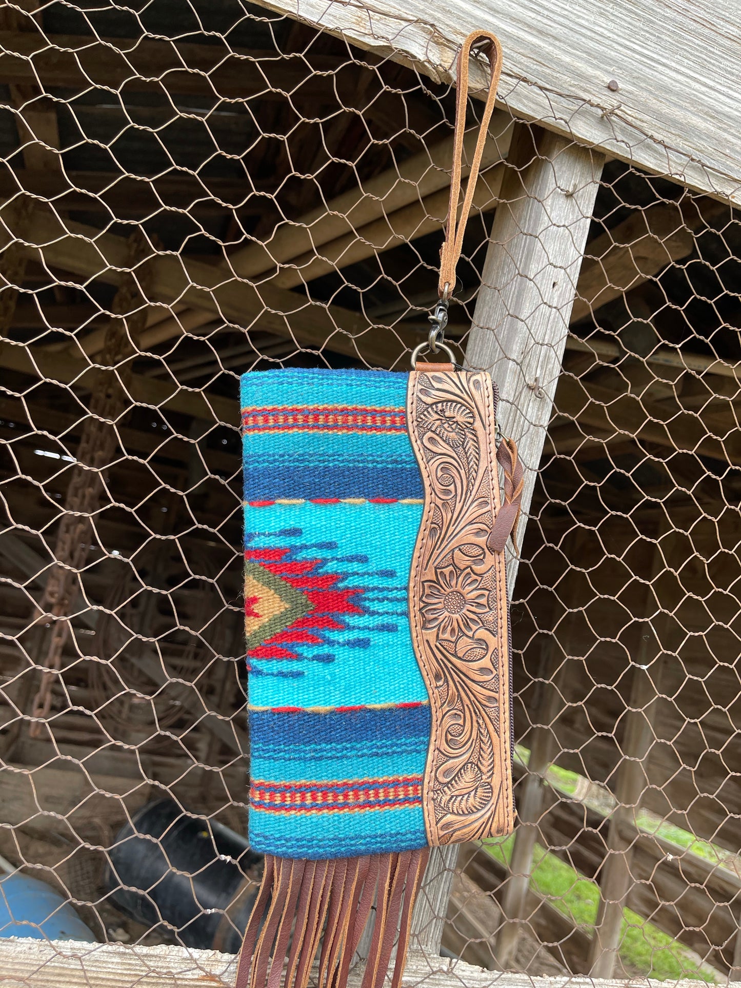 American Darling turquoise saddle blanket wristlet with fringe